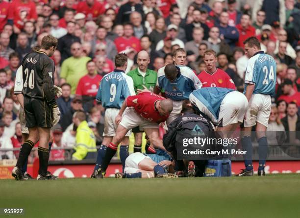 Roy Keane of Manchester United shouts at Alf Inge Haaland of Manchester City following his red card during the FA Carling Premiership match played at...