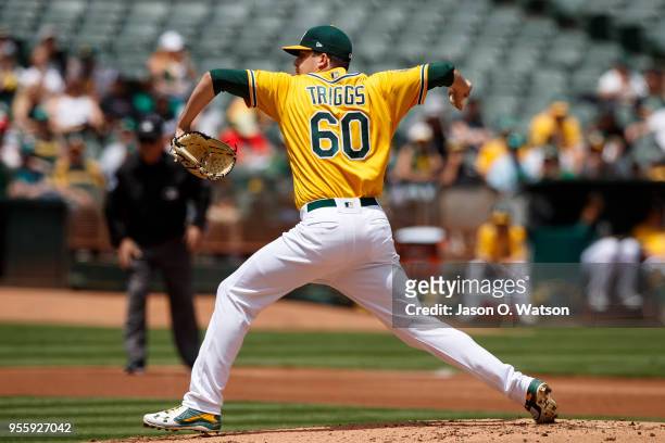 Andrew Triggs of the Oakland Athletics pitches against the Baltimore Orioles during the second inning at the Oakland Coliseum on May 6, 2018 in...