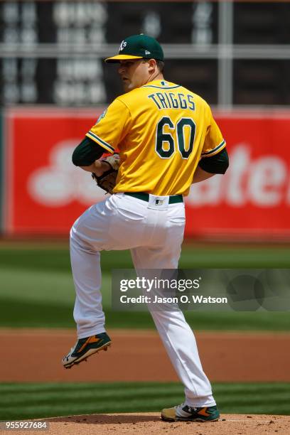 Andrew Triggs of the Oakland Athletics pitches against the Baltimore Orioles during the first inning at the Oakland Coliseum on May 6, 2018 in...