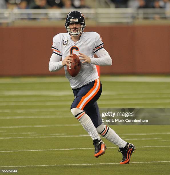 Jay Cutler of the Chicago Bears scrambles with the football against the Detroit Lions at Ford Field on January 3, 2010 in Detroit, Michigan. The...