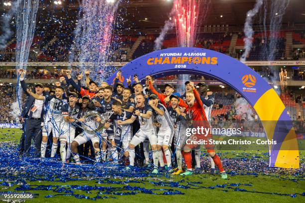 Victory players celebrate winning the 2018 A-League Grand Final match between the Newcastle Jets and the Melbourne Victory at McDonald Jones Stadium...
