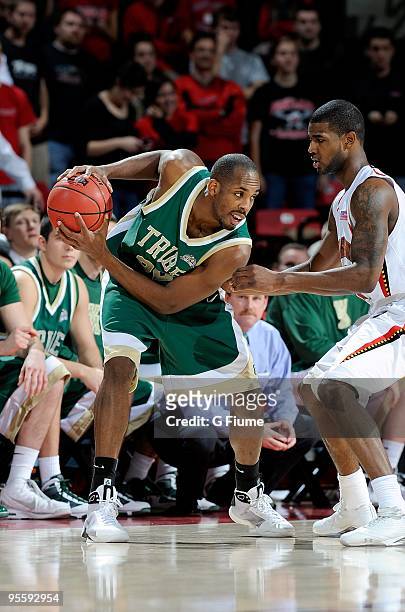 Danny Sumner of the William and Mary Tribe handles the ball against the Maryland Terrapins at the Comcast Center on December 30, 2009 in College...
