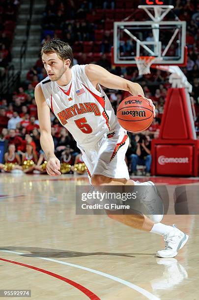 Eric Hayes of the Maryland Terrapins handles the ball against the William and Mary Tribe at the Comcast Center on December 30, 2009 in College Park,...