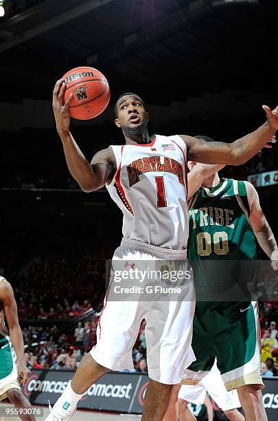 Landon Milbourne of the Maryland Terrapins grabs a rebound against the William and Mary Tribe at the Comcast Center on December 30, 2009 in College...