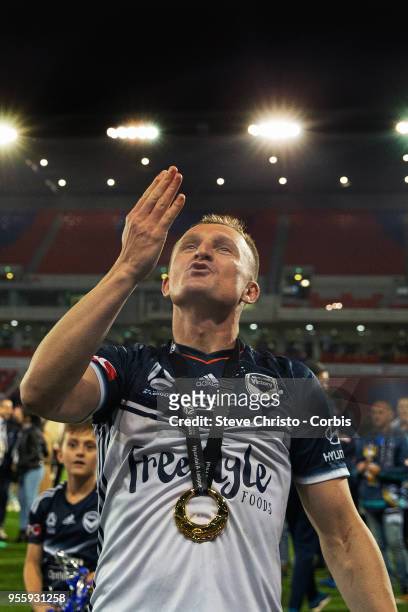 Besart Berisha of Melbourne Victory blows a kiss to fans after winning the 2018 A-League Grand Final match between the Newcastle Jets and the...