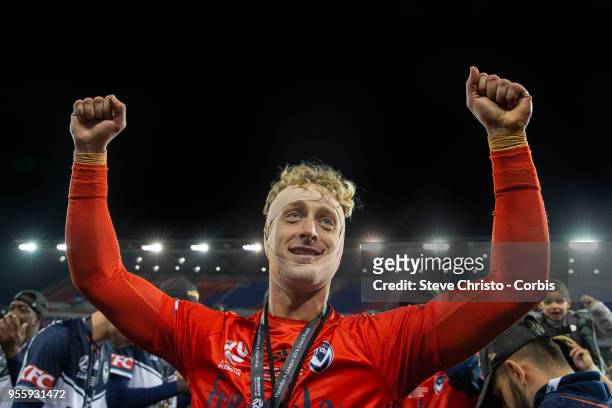 Lawrence Thomas of Melbourne Victory thanks fans after winning the 2018 A-League Grand Final match between the Newcastle Jets and the Melbourne...