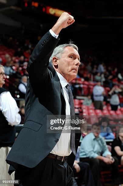 Head coach Gary Williams of the Maryland Terrapins pumps his fist to the crowd before the game against the William and Mary Tribe at the Comcast...