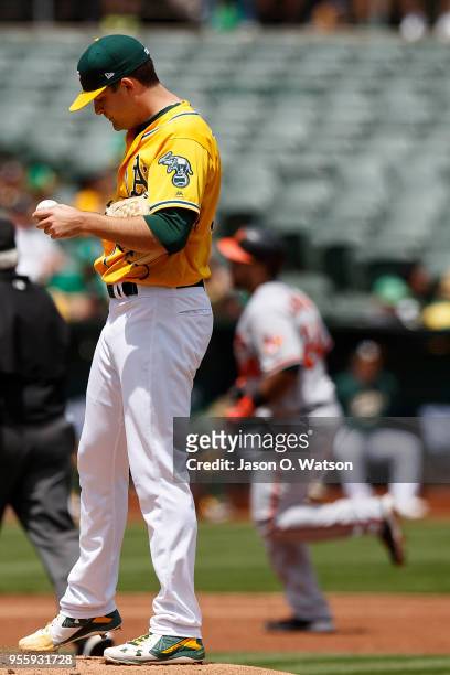 Pedro Alvarez of the Baltimore Orioles rounds the bases after hitting a home run off of Andrew Triggs of the Oakland Athletics during the second...
