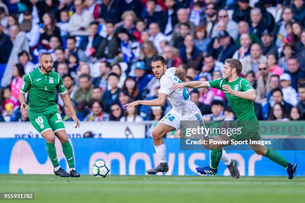 Daniel Ceballos Fernandez, D Ceballos, of Real Madrid fights for the ball with Darko Brasanac of CD Leganes and Nabil El Zhar of CD Leganes during...