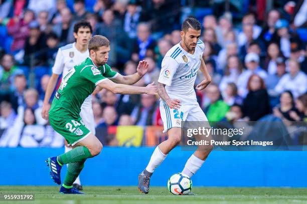 Daniel Ceballos Fernandez, D Ceballos, of Real Madrid fights for the ball with Darko Brasanac of CD Leganes during the La Liga 2017-18 match between...