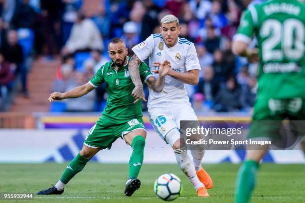 Nabil El Zhar of CD Leganes fights for the ball with Theo Hernandez of Real Madrid during the La Liga 2017-18 match between Real Madrid and CD...