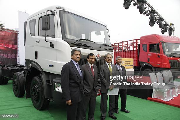 Anand Mahindra, Dr. Pawan Goenka, Dee Kapur and Pawan Kalra at the launch of Mahindra Navistar trucks in New Delhi on Monday, January 4, 2010.