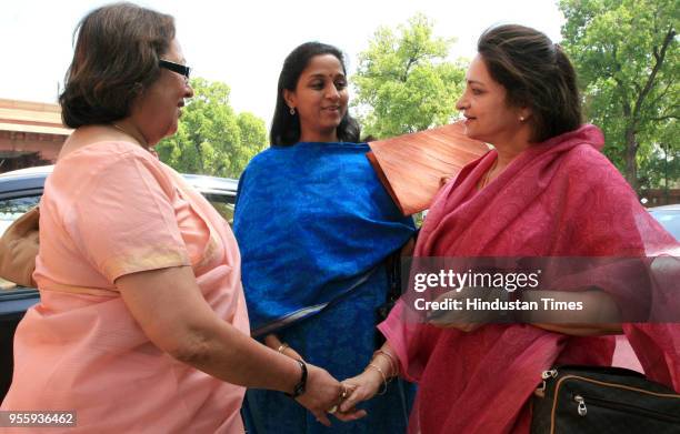 Rajya Sabha MPs Najma Heptullah, Supriya Sule and Maya Singh arrive to attend the Budget session at Parliament House on April 15 in New Delhi, India.