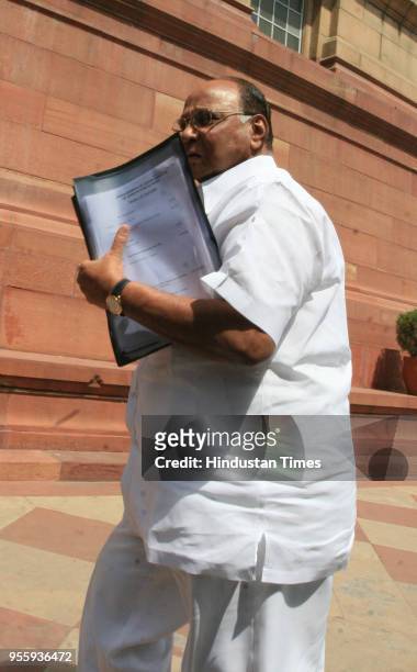 Union Minister Sharad Pawar arrives to attend the Budget session at Parliament House on April 15 in New Delhi, India.