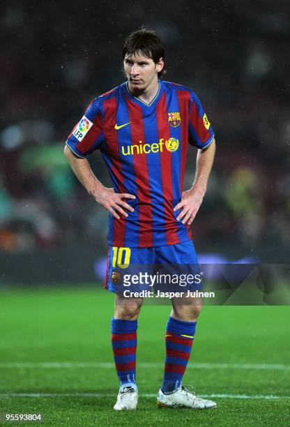 Lionel Messi of FC Barcelona looks on during the 1/8 final Copa del Rey match between Barcelona and Sevilla at the Camp Nou stadium on January 5,...
