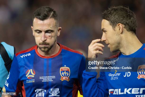 Roy O'Donovan of the Jets walks off after being elbowed by Besart Berisha of Melbourne Victory during the 2018 A-League Grand Final match between the...