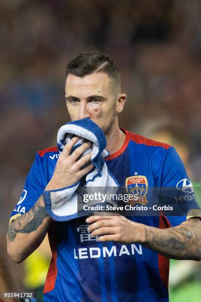 Roy O'Donovan of the Jets walks off after being elbowed by Besart Berisha of Melbourne Victory during the 2018 A-League Grand Final match between the...