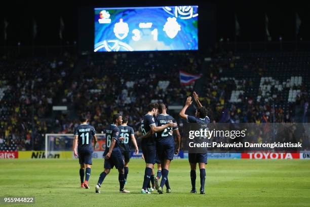 Edgar of Buriram United celebrates scoring his side's third goal with his team mates during the AFC Champions League Round of 16 first leg match...