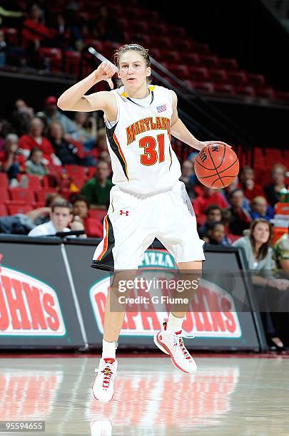 Lori Bjork of the Maryland Terrapins handles the ball against the Stony Brook Seawolves at the Comcast Center on December 27, 2009 in College Park,...