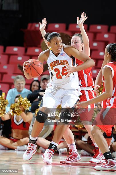 Diandra Tchatchouang of the Maryland Terrapins handles the ball against the Stony Brook Seawolves at the Comcast Center on December 27, 2009 in...