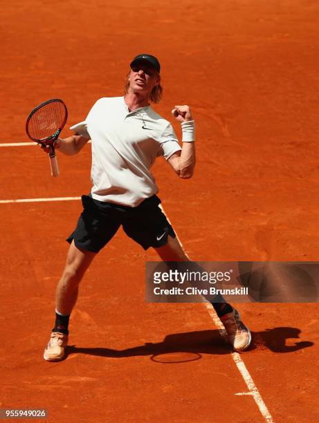 Denis Shapovalov of Canada celebrates a point against Benoit Paire of France in their second round match during day four of the Mutua Madrid Open...