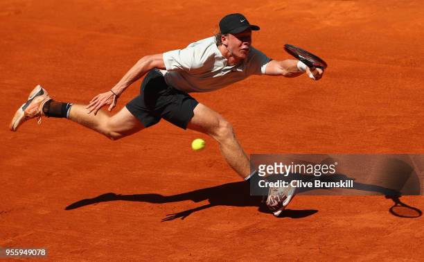 Denis Shapovalov of Canada plays a forehand against Benoit Paire of France in their second round match during day four of the Mutua Madrid Open...