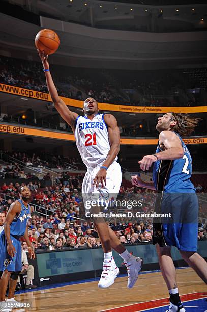 Thaddeus Young of the Philadelphia 76ers shoots against Fabricio Oberto of the Washington Wizards during the game on January 5, 2010 at the Wachovia...