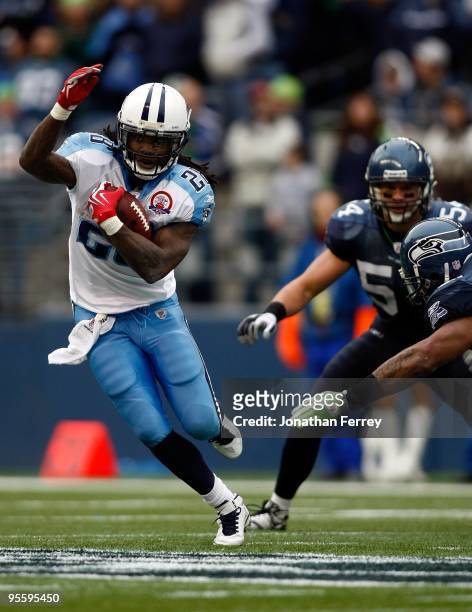 Chris Johnson of the Tennessee Titans runs with the ball against the Seattle Seahawks at Qwest Field on January 3, 2010 in Seattle, Washington....