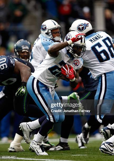 Chris Johnson of the Tennessee Titans runs with the ball against the Seattle Seahawks at Qwest Field on January 3, 2010 in Seattle, Washington....