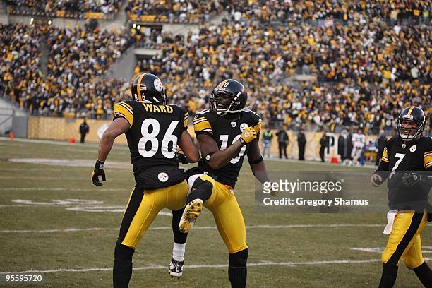 Hines Ward and Santonio Holmes of the Pittsburgh Steelers celebrate during the game against the Oakland Raiders on December 6, 2009 at Heinz Field in...