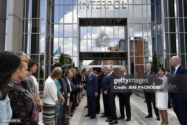 Britain's Prince Charles , the Prince of Wales visits the headquarters of international police organisation Interpol in Lyon, central eastern France,...