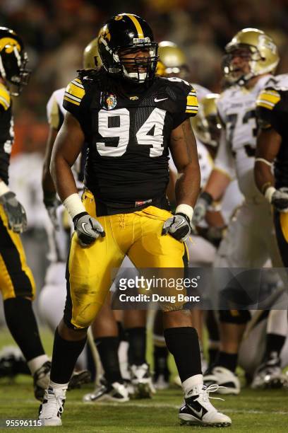Adrian Clayborn of the Iowa Hawkeyes reacts to a defensive stop against the Georgia Tech Yellow Jackets during the FedEx Orange Bowl at Land Shark...