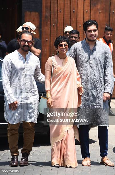 Indian Bollywood actor Aamir Khan , his wife, the director Kiran Rao and son Juned Khan arrive ahead of the marriage ceremony of Bollywood actress...