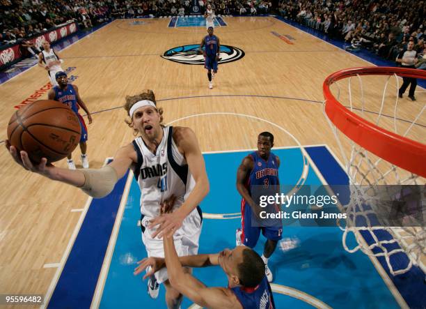 Dirk Nowitzki of the Dallas Mavericks goes to the bucket against the Detroit Pistons during a game at the American Airlines Center on January 5, 2010...