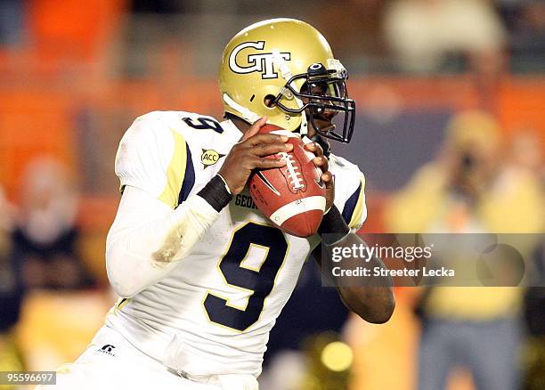 Quarterback Josh Nesbitt of the Georgia Tech Yellow Jackets looks to pass against the Iowa Hawkeyes during the FedEx Orange Bowl at Land Shark...