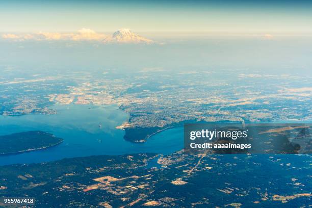 aerial view southwest over tacoma to mount rainer - tacoma snow stock pictures, royalty-free photos & images