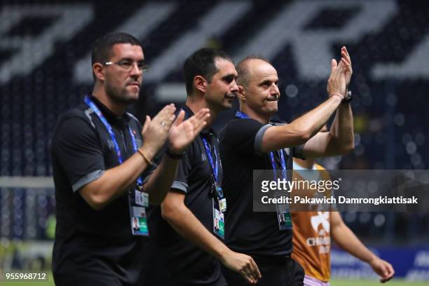 Head coach Bozidar Bandovic of Buriram United and his staffs applaud supporters after their 3-2 victory in the AFC Champions League Round of 16 first...