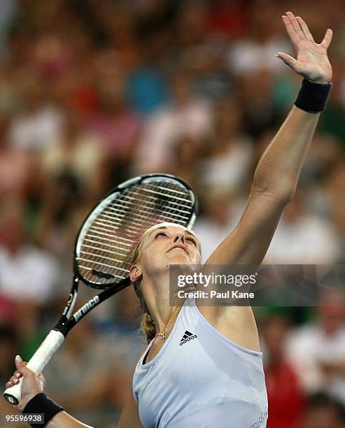 Sabine Lisicki of Germany serves in her match against Laura Robson of Great Britain in the Group B match between Great Britain and Germany during day...