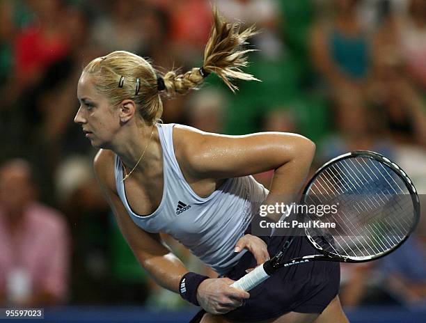 Sabine Lisicki of Germany serves in her match against Laura Robson of Great Britain in the Group B match between Great Britain and Germany during day...