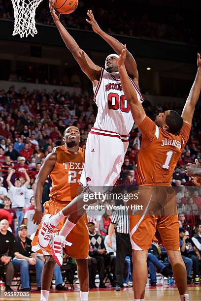 Mike Washington of the Arkansas Razorbacks goes up for a layup against the Texas Longhorns at Bud Walton Arena on January 5, 2010 in Fayetteville,...