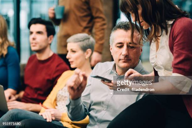 group of business people before meeting - presentation party stock pictures, royalty-free photos & images