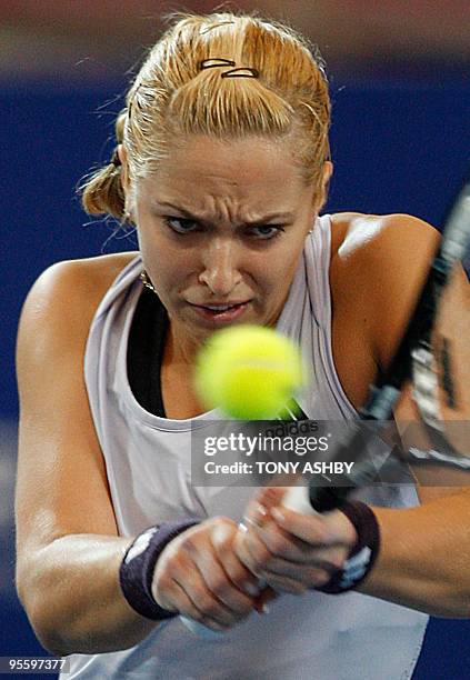 Sabine Lisicki of Germany returns against Laura Robson of Britain during their singles match on the seventh session, day five of the Hopman Cup in...