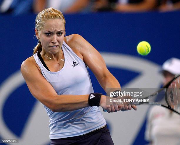 Sabine Lisicki of Germany returns against Laura Robson of Britain during their singles match on the seventh session, day five of the Hopman Cup in...