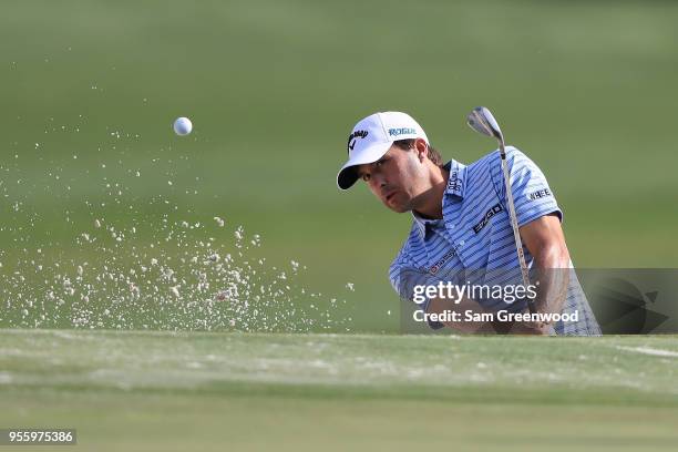 Kevin Kisner of the United States plays a shot from a bunker during practice rounds prior to THE PLAYERS Championship on the Stadium Course at TPC...