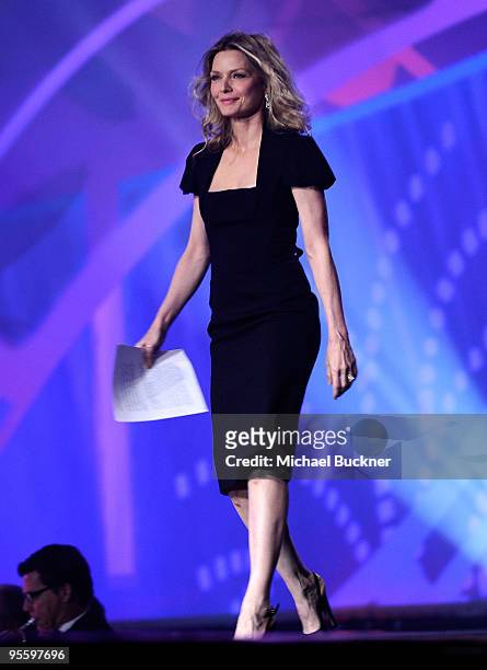 Actress Michelle Pfeiffer presents the Desert Palm Achievement award onstage at the 2010 Palm Springs International Film Festival gala held at the...