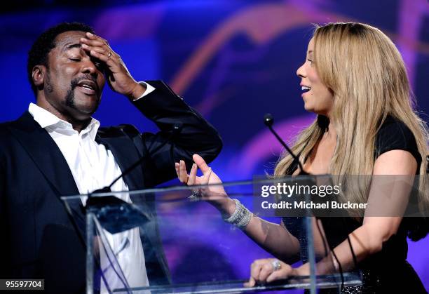 Director/producer Lee Daniels presents actress/singer Mariah Carey with the Breakthrough Actress Performance award onstage at the 2010 Palm Springs...