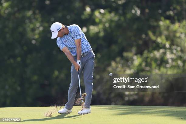 Kevin Kisner of the United States plays a shot during practice rounds prior to THE PLAYERS Championship on the Stadium Course at TPC Sawgrass on May...