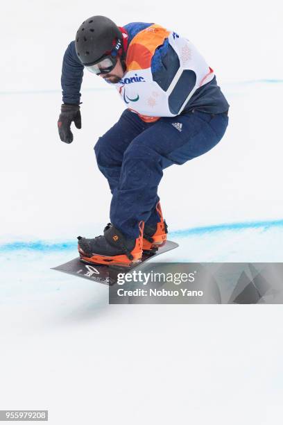 Ben Moore of Great Britain competes in the Snowboard Men's Bank Slalom SB-UL Run1 during day 7 of the PyeongChang 2018 Paralympic Games on March 16,...