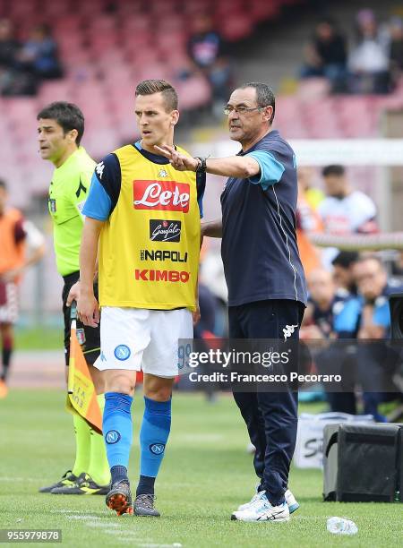 Arkadiusz Milik of SSC Napoli and the coach Maurizio Sarri during the serie A match between SSC Napoli and Torino FC at Stadio San Paolo on May 6,...