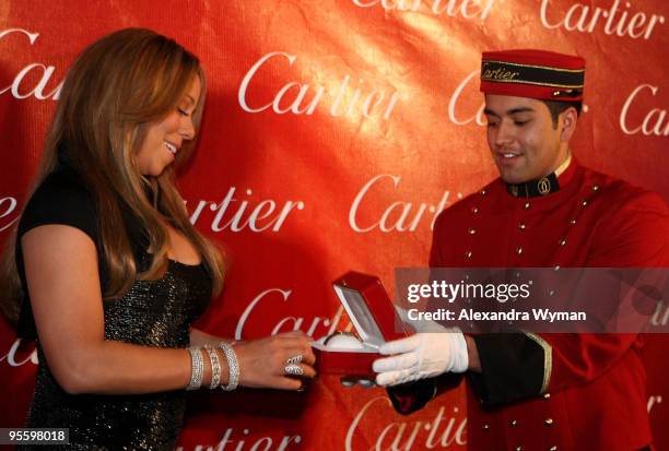 Actress/singer Mariah Carey poses backstage during the 2010 Palm Springs International Film Festival gala held at the Palm Springs Convention Center...